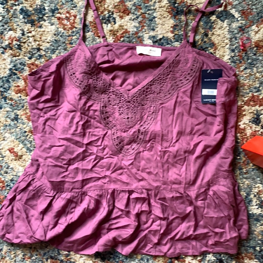 Lucky brand berry colored top with crocheted detail. Size large